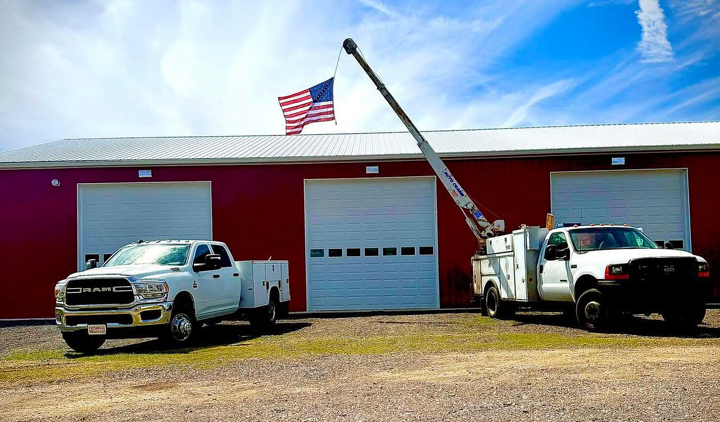 The Faith Driven Diesel shop in Preston with two service trucks out front