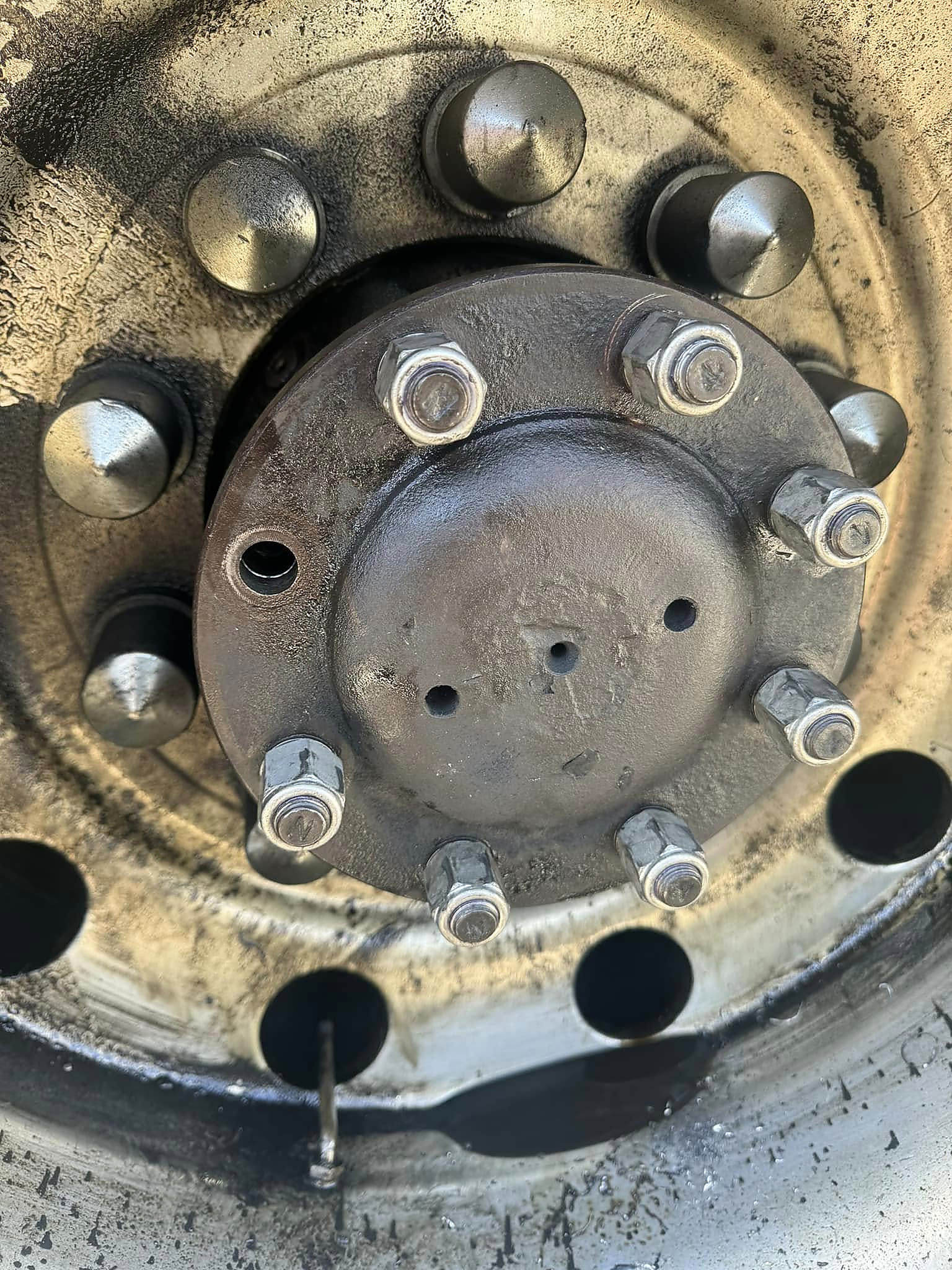 Hub and lug work on a heavy truck.